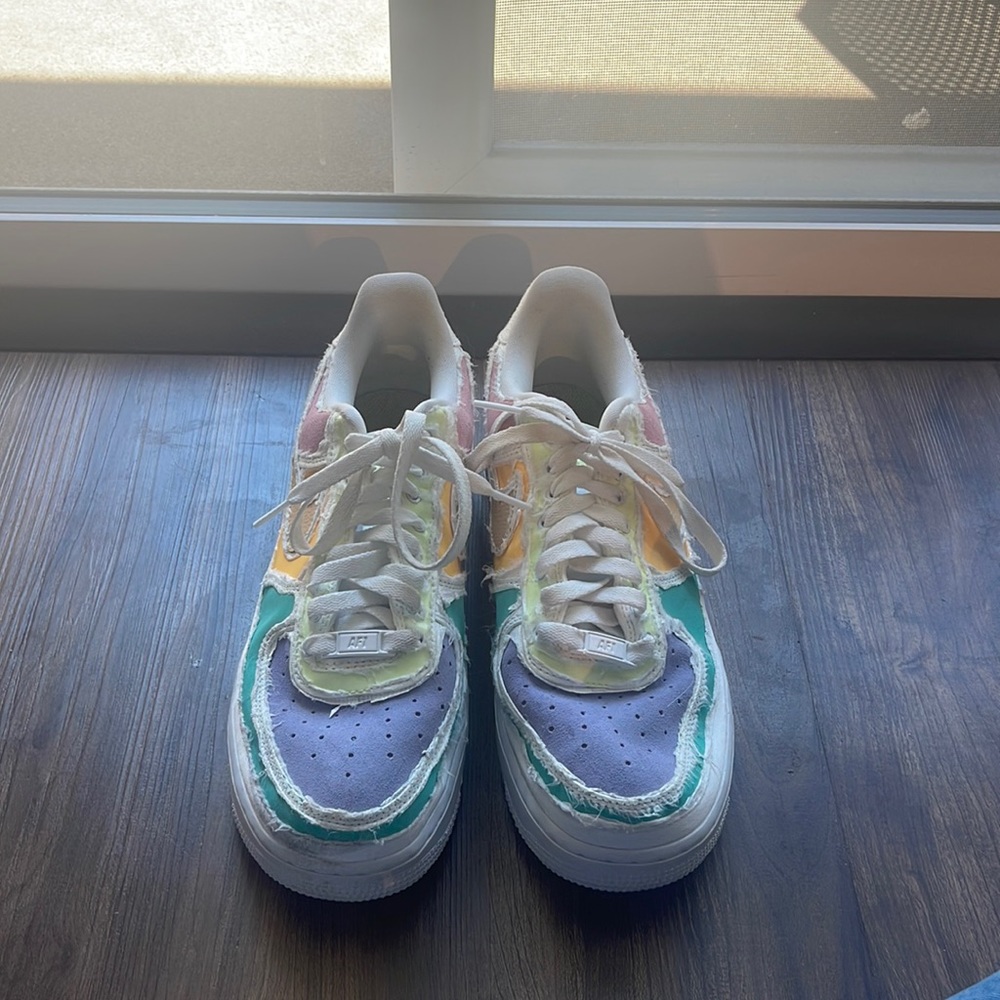 Nike Air Force ones rip away